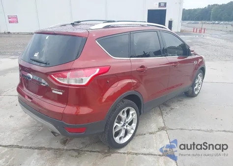 2014 Ford Escape Titanium z USA, uszkodzony, nr VIN 1FMCU0J9XEUA89585